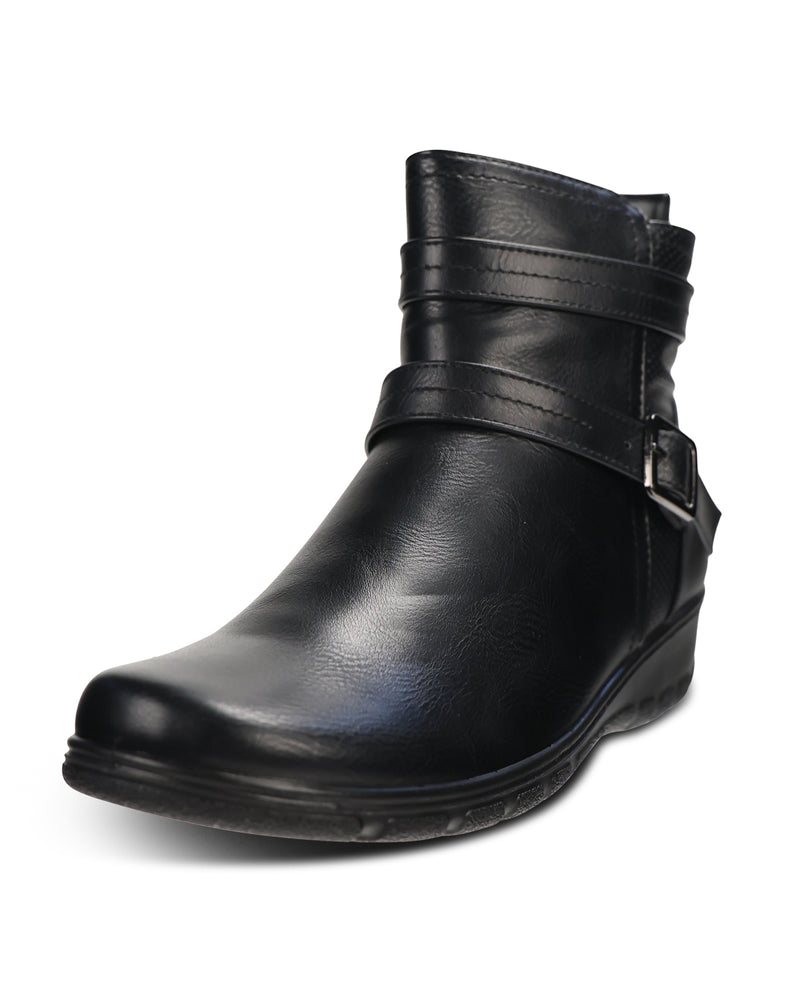 A single black leather ankle boot with a low wedge heel, featuring a decorative strap across the instep with a silver-tone buckle, shown against a plain white background.