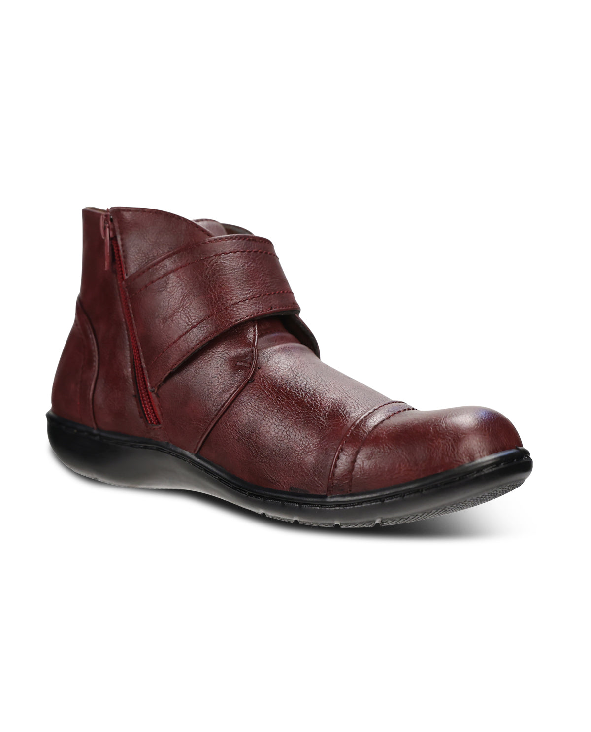 A single dark red leather ankle boot with a strap closure and a decorative metal button, shown from a side profile on a white background.