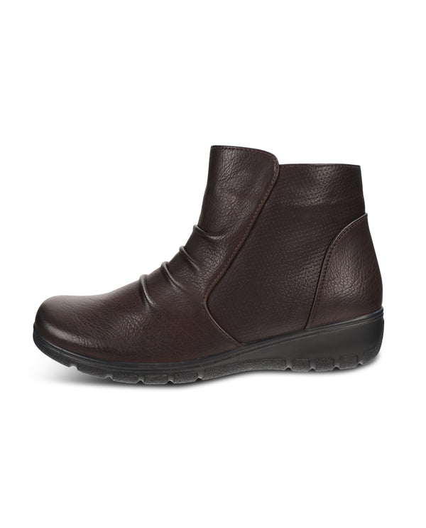 A dark brown pebbled leather ankle boot with a low black sole, shown in a side profile view against a plain white background.