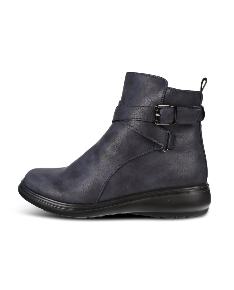 A dark navy blue leather ankle boot with a side buckle strap and a thick black sole, shown from a side profile on a white background.