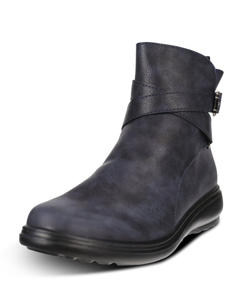 A dark navy blue leather ankle boot with a wrap-around strap and buckle detail on the side, set against a plain white background.