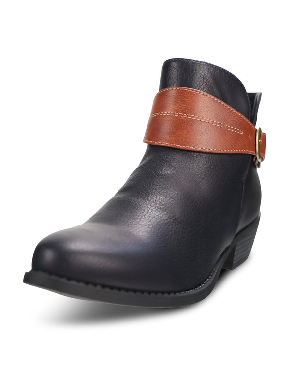 A single women's ankle boot in Navypebbled leather with a contrasting brown leather strap across the ankle and a gold-tone buckle, shown from a side profile on a white background.