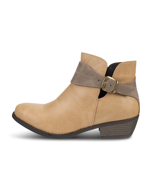 A tan ankle boot with a taupe-brown strap across the instep featuring a gold-tone buckle, set against a plain white background.