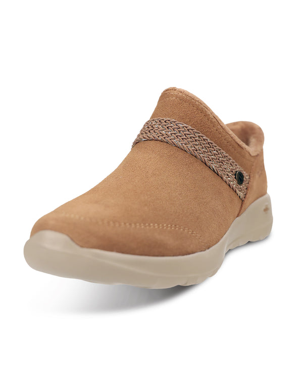 A tan suede slip-on shoe with a textured woven strap and a light beige sole, shown on a white background.