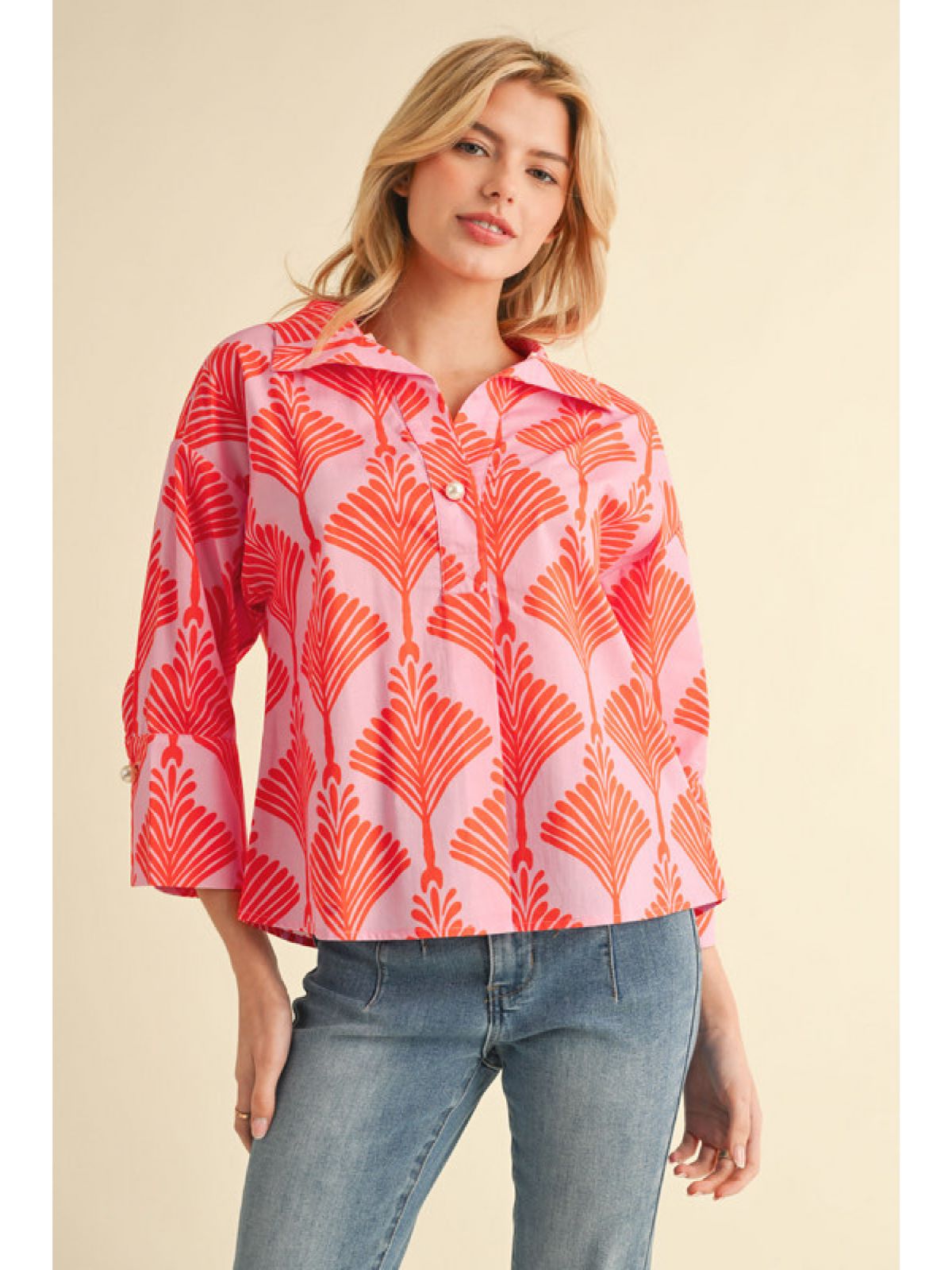 Print Top with Open Collared Neck Features Peal Buttoned Closure and Three Quarters Sleeves