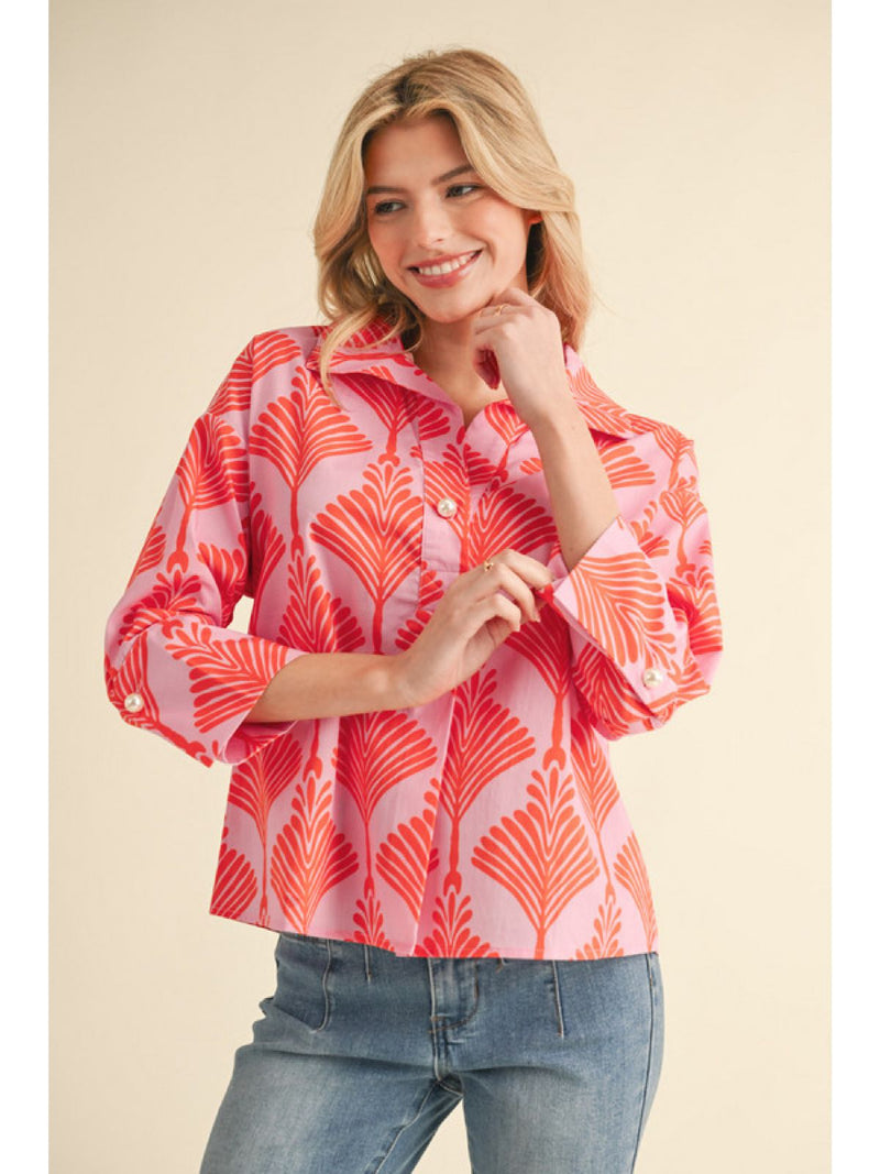 Print Top with Open Collared Neck Features Peal Buttoned Closure and Three Quarters Sleeves