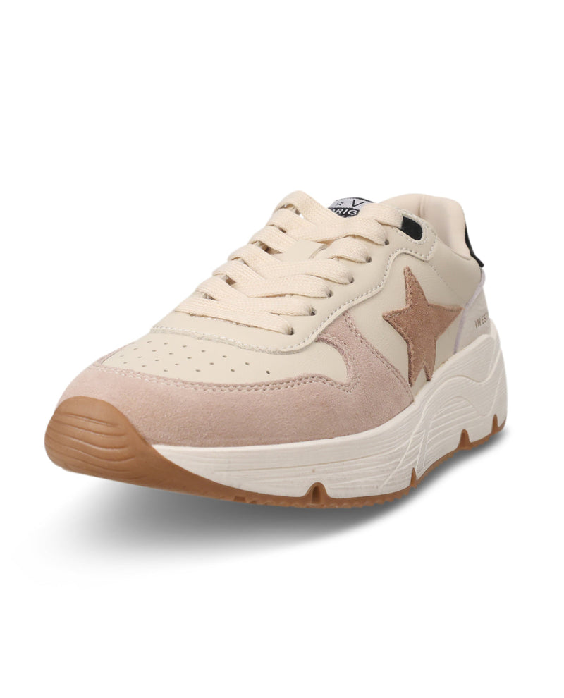 A low-top sneaker in beige and cream suede and mesh, featuring a large star on the side, cream laces, and a chunky white midsole with a gum brown outsole.