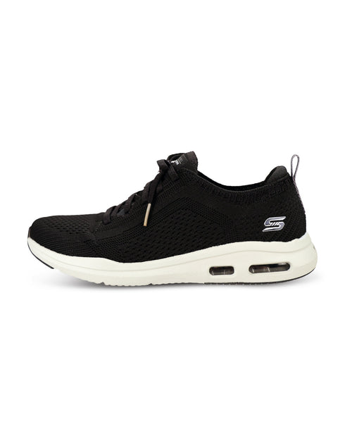 A black knit athletic sneaker with a thick, chunky off-white midsole and a small gold accent near the laces, shown from a three-quarters angle on a white background.