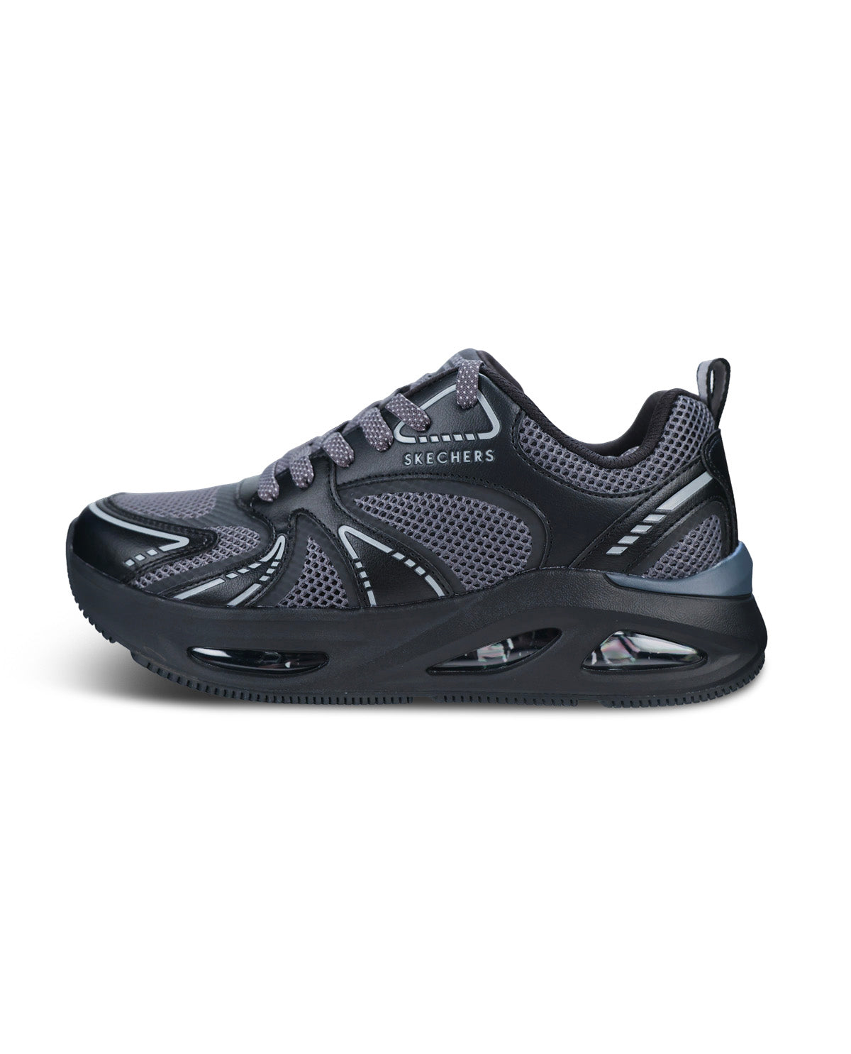 A Skechers athletic sneaker in dark gray and black, featuring a breathable mesh upper, gray laces, and a thick cushioned black sole with visible air cushioning chambers, shown against a plain white background.