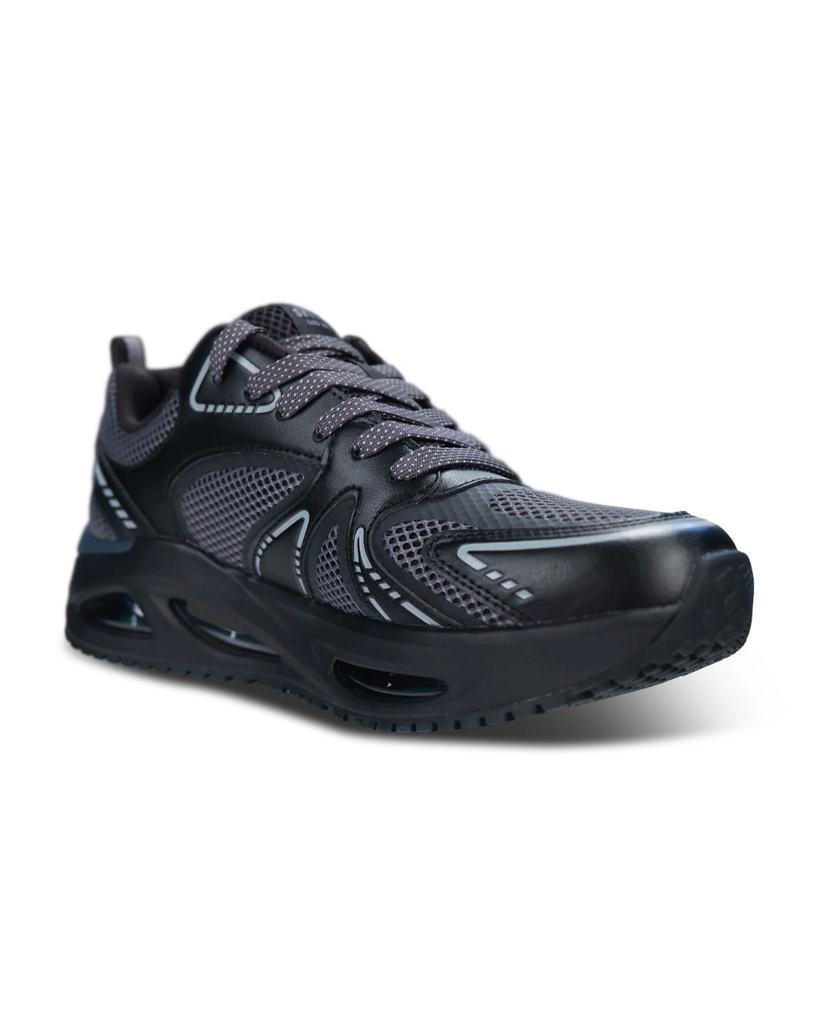 A Skechers athletic sneaker in dark gray and black, featuring a breathable mesh upper, gray laces, and a thick cushioned black sole with visible air cushioning chambers, shown against a plain white background.