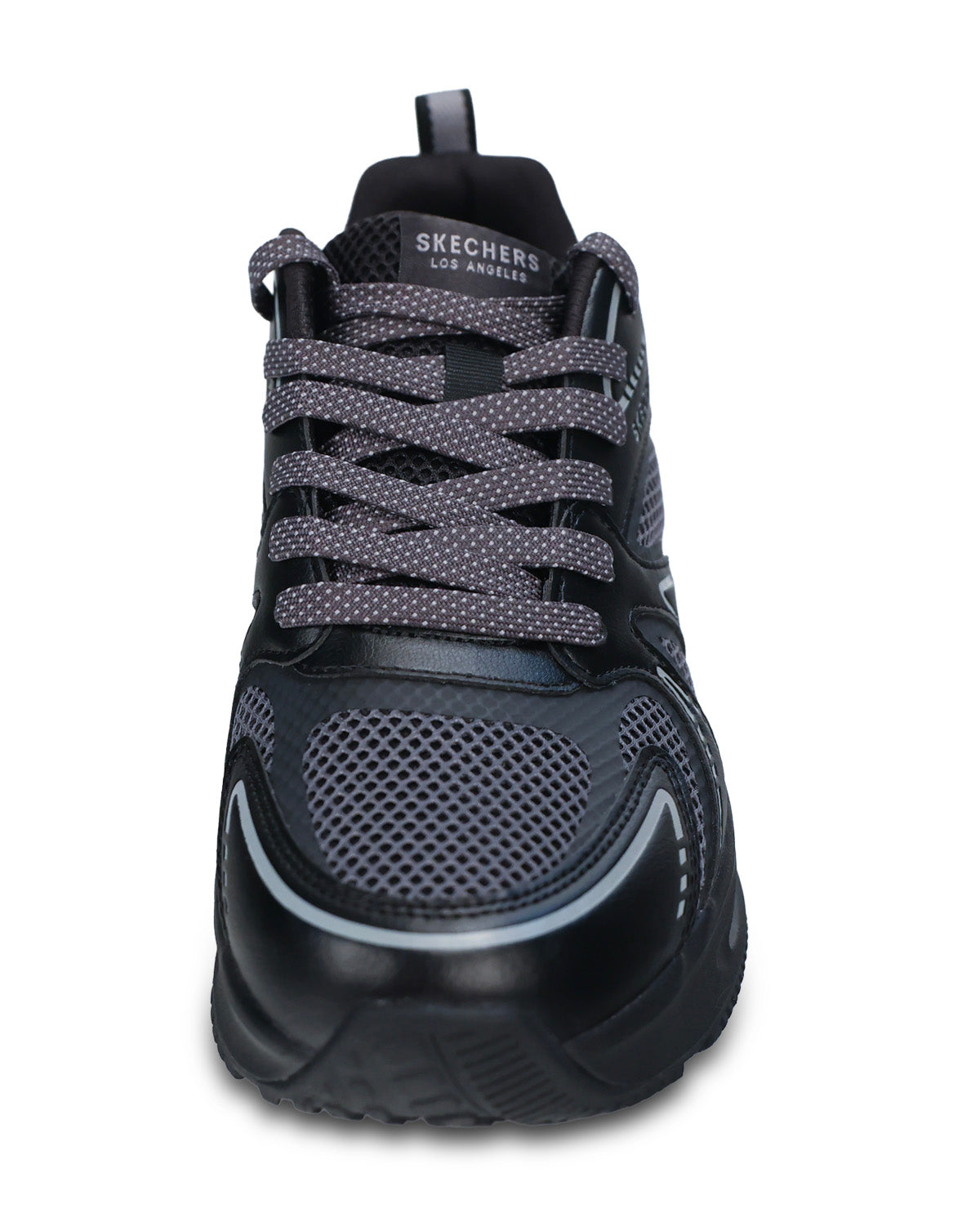 A Skechers low-top athletic shoe in black and dark gray, featuring a mesh toe box, patterned laces, and a thick black sole, shown from a front-facing perspective on a white background.