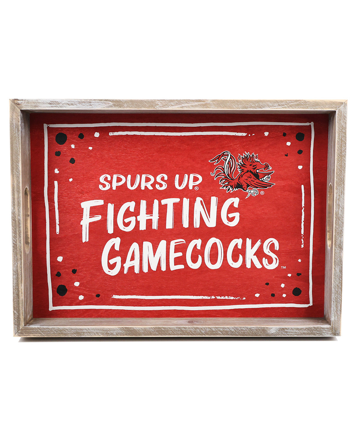 Decorative sign with 'Spurs Up Fighting Gamecocks' text and logo on a red background.