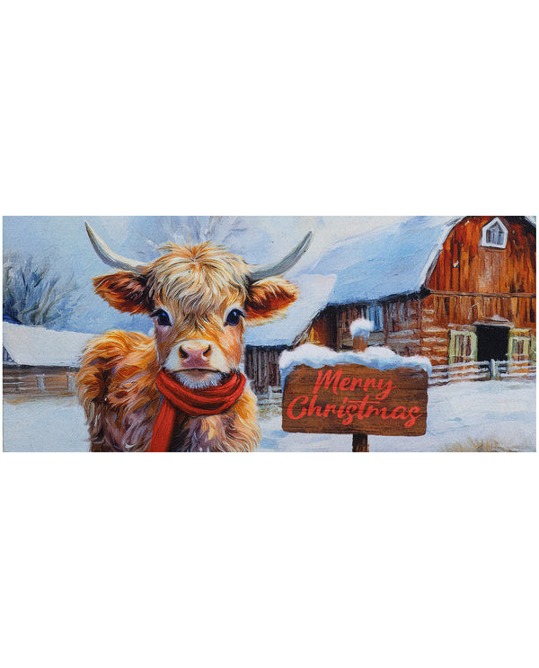 A festive winter farm scene artwork featuring a fluffy Highland cow in the foreground wearing a red scarf and standing beside a wooden sign that reads “Merry Christmas.” A snow-covered barn and snowy landscape appear in the background.