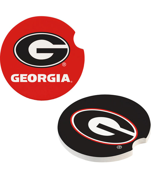 Two Georgia Bulldogs branded coasters on a white background, one red with a black and white logo and the other black with a red and white logo.