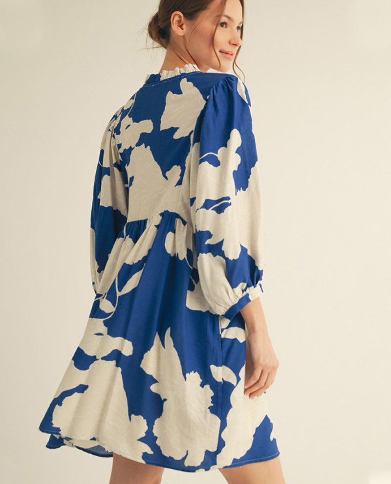 Jodifl Plus Floral Peasant Dress with Ruffle Neckline Detail and Side Pockets