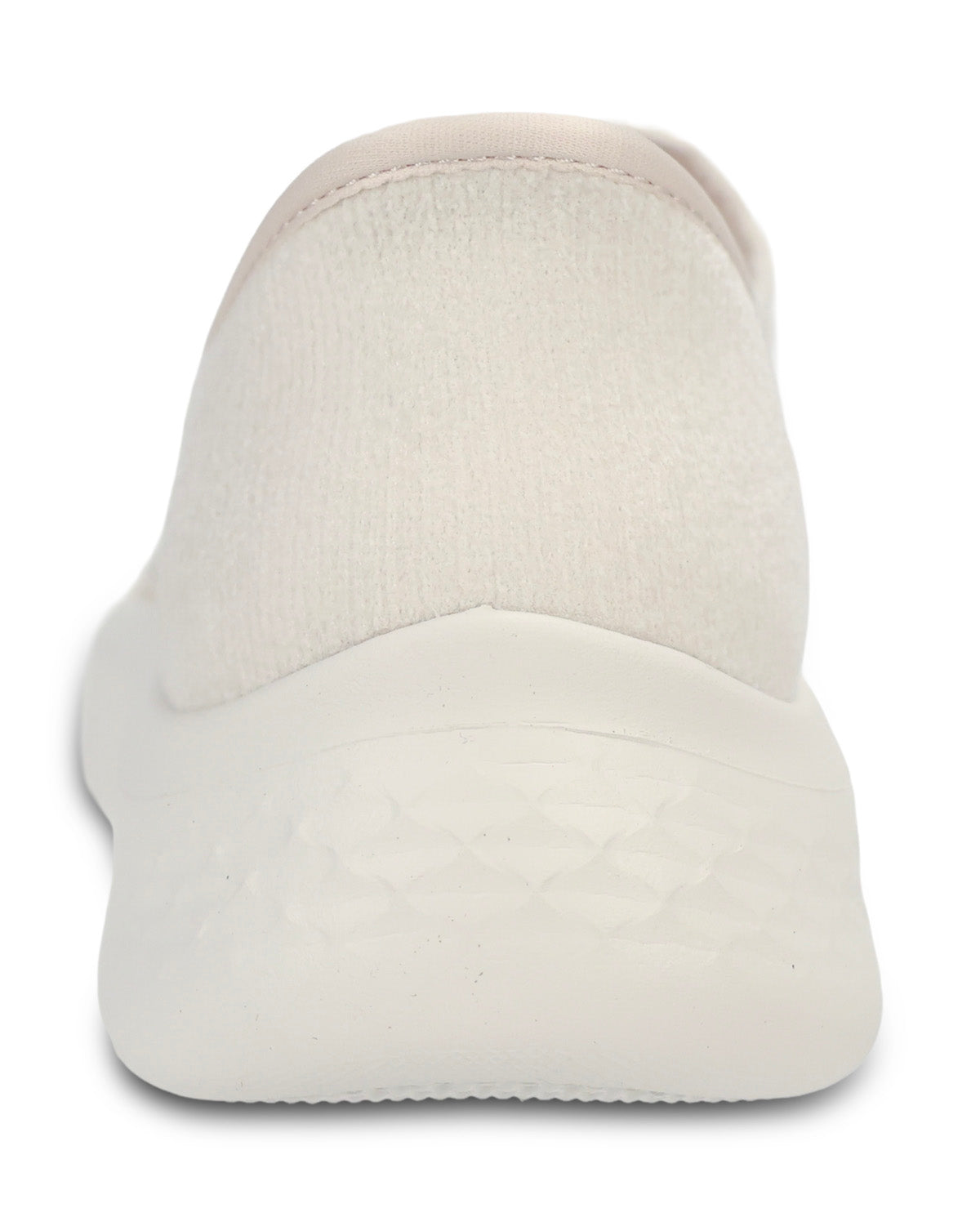 A close-up rear view of a slip-on shoe with a textured knit upper and a thick, patterned white sole, shown against a plain white background.