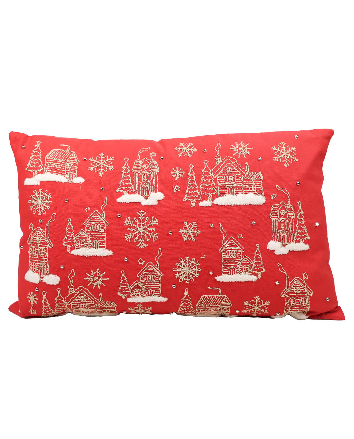 Red pillow with white winter village design on a white background