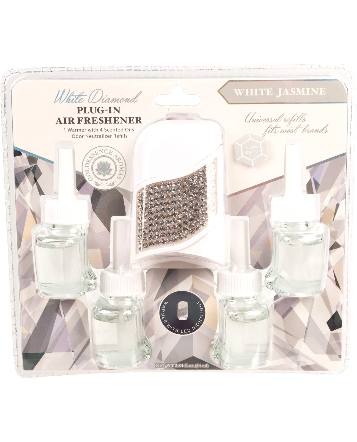 Plug-in air freshener set with crystals and packaging on a white background
