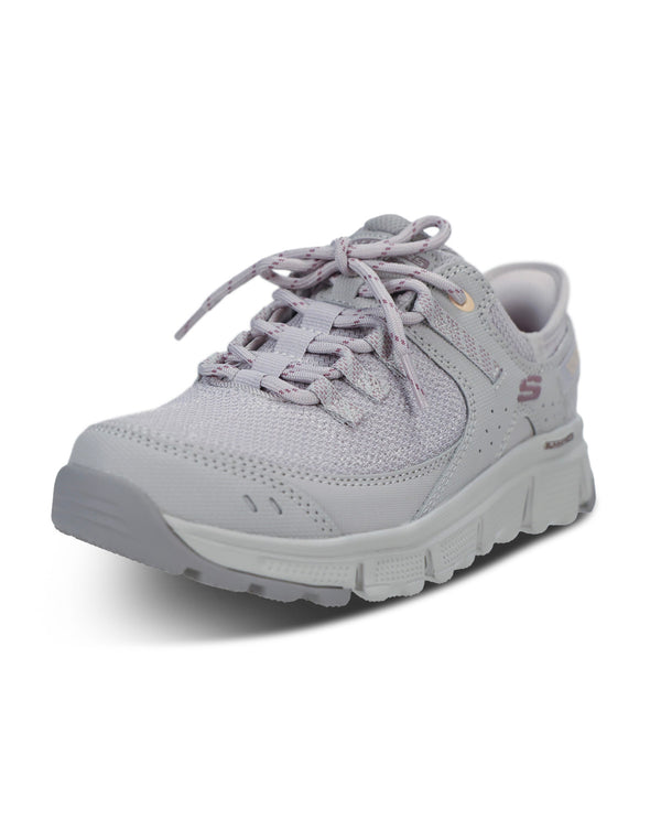 A light gray Skechers walking shoe with matching gray laces and a textured sole, shown from a three-quarters angle on a white background.