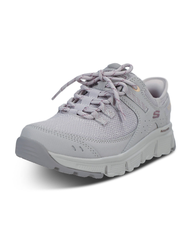 A light gray Skechers walking shoe with matching gray laces and a textured sole, shown from a three-quarters angle on a white background.