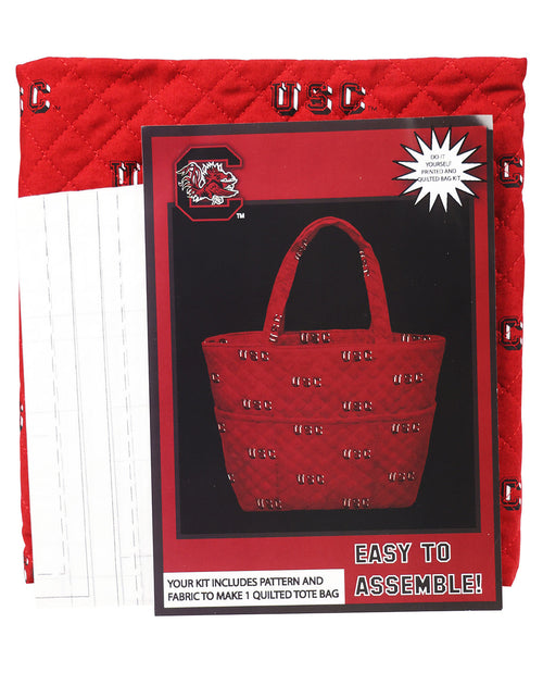 Red quilted tote bag kit with pattern and assembly instructions on a white background