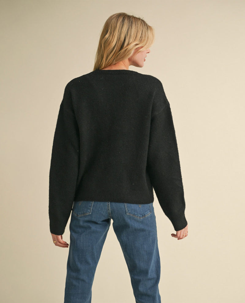 Black Sweater with Vibrant Colored Bows