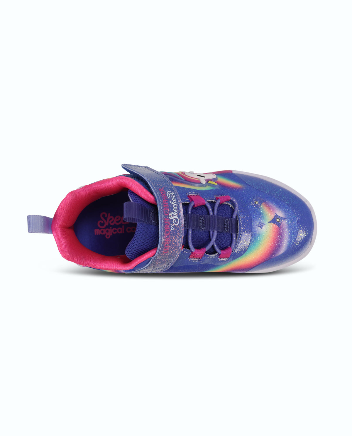A children's Skechers shoe in a vibrant blue color with a holographic rainbow stripe across the side, pink lining, and a hook-and-loop strap closure.