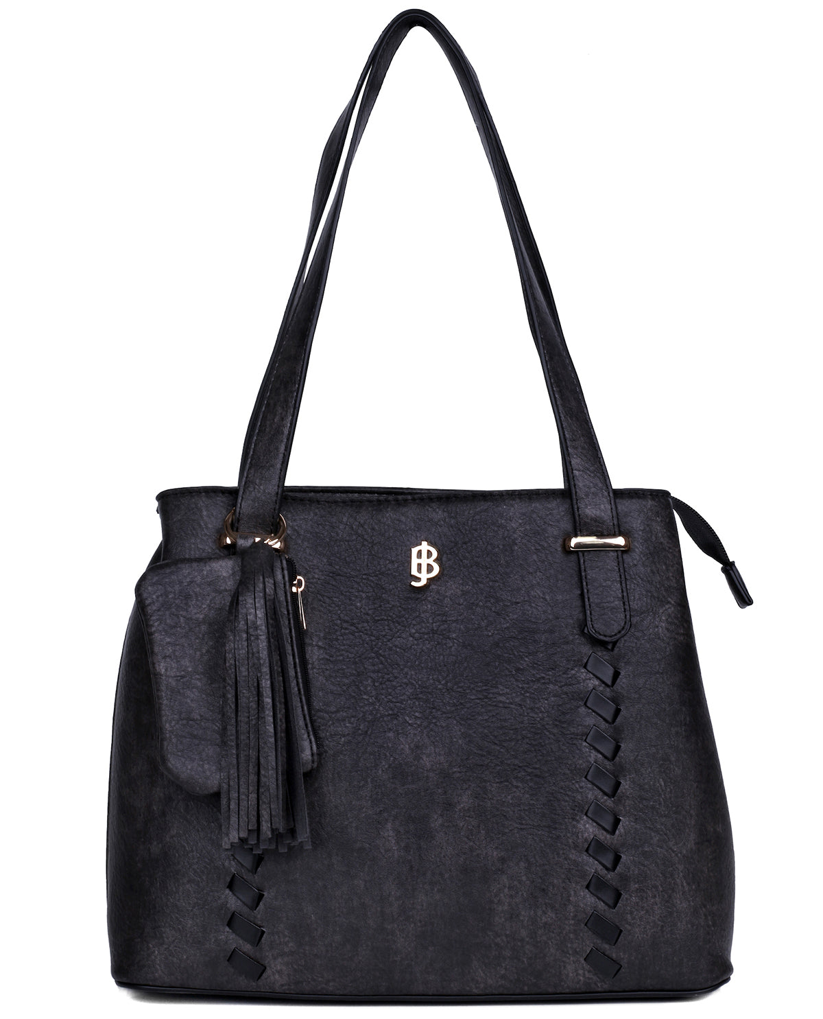 A black faux-leather tote bag with dual shoulder straps, a front tassel detail, and decorative braided stitching on the sides, featuring a small gold monogram logo on the front.