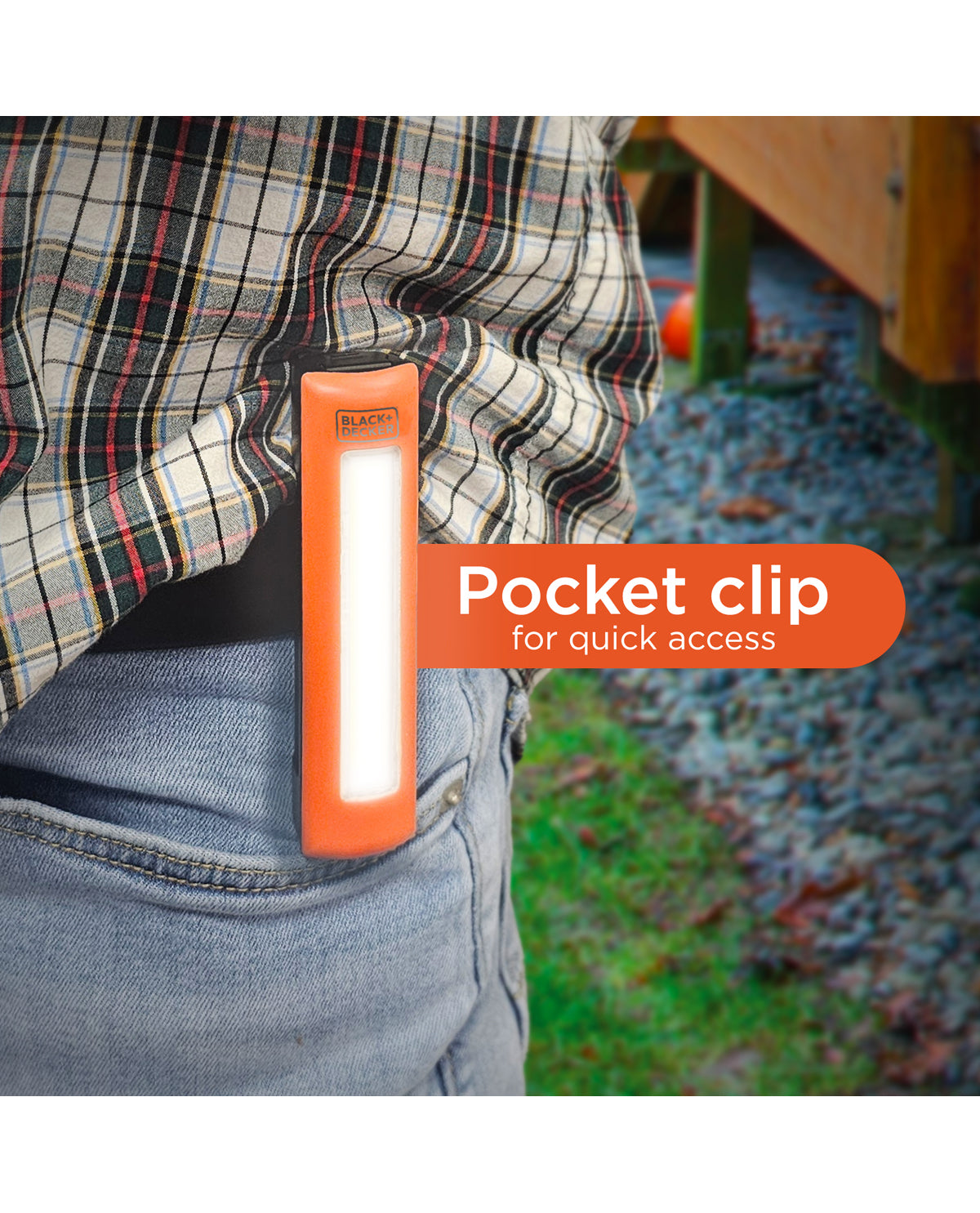 Orange flashlight with clip attached to a person's pocket, with text 'Pocket clip for quick access' on a blurred outdoor background.