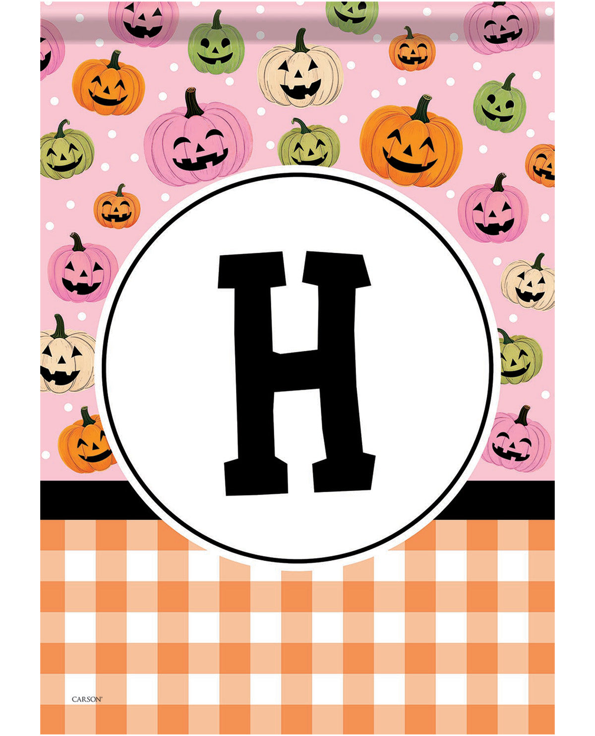 A square Halloween-themed decorative print or flag design featuring a large black letter H inside a white oval in the center, with a pink background above covered in colorful jack-o'-lantern pumpkins and a peach-and-white gingham pattern below.