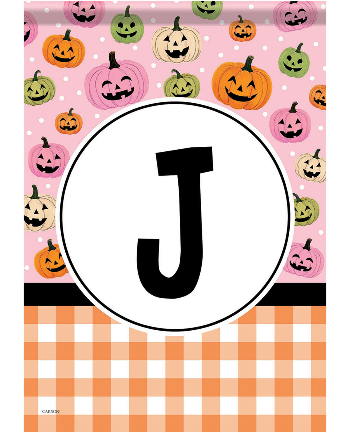 A square decorative print or flag design featuring a pink top section with white polka dots, orange and green jack-o'-lantern pumpkins, a large black letter J inside a white oval, and an orange-and-white gingham pattern across the bottom.