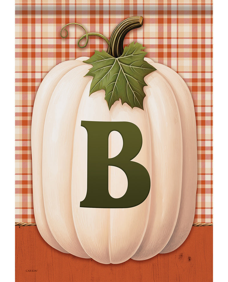 A decorative autumn flag featuring a large cream-colored pumpkin with a dark green leaf and stem, a bold dark green letter B on the front, and an orange-and-white plaid background.