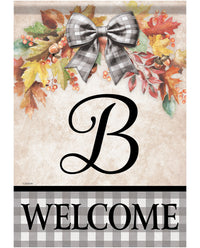 Autumn-themed welcome garden flag featuring a large black script letter 'B' in the center, surrounded by colorful fall leaves, acorns, and a gray-and-white gingham bow. The bottom section has a black and white gingham border with the word 'WELCOME' in bold black letters.