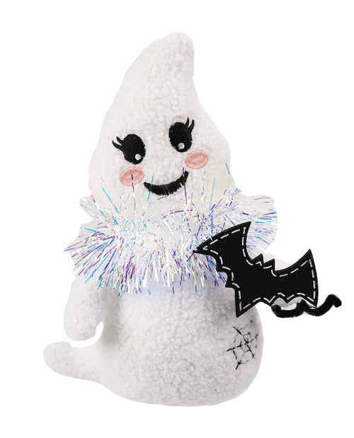 A white plush ghost toy with embroidered black eyes and mouth, pink cheeks, a shiny iridescent tinsel collar, and a black bat accessory, shown on a plain white background.