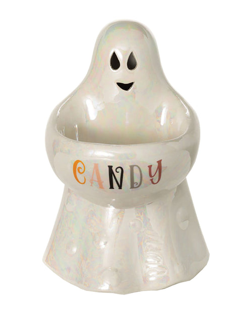 A ghost-shaped ceramic candy dish with a glossy white finish and an iridescent sheen. The word 'CANDY' is printed across the waist in orange, black, and gray letters, with the eyes and mouth cutouts on the head.