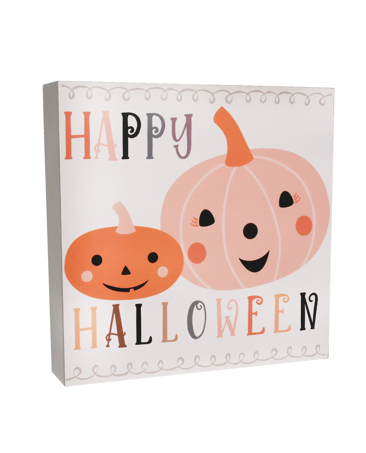 A square decorative sign or canvas print with a white background, featuring two smiling cartoon pumpkins and the words 'HAPPY HALLOWEEN' in mixed black, peach, and gray lettering.