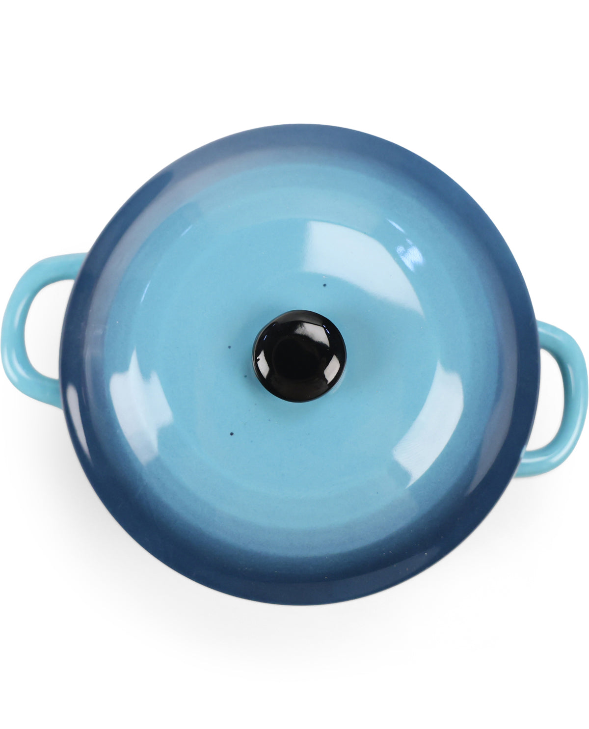 A top-down view of a round blue enameled cast iron pot or Dutch oven with two side handles and a black knob on the lid, set against a plain white background.