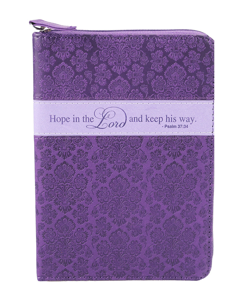 A purple zippered Bible journal with an embossed damask pattern, featuring a light purple horizontal band across the center with the printed quote 'Hope in the Lord and keep his way. Psalm 37:4'.