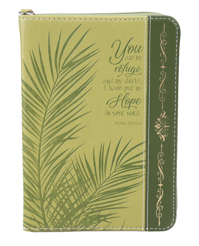 A zippered Bible journal with a green palm leaf design and a gold decorative border on the spine, featuring a Bible verse from Psalm 119:103.