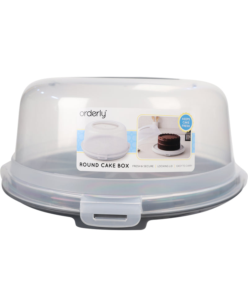 A clear plastic round cake box with a hinged lid and a printed product label on the front, shown on a plain white background.