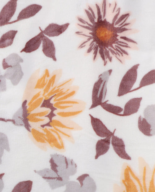 Floral pattern with sunflowers and leaves on a white background