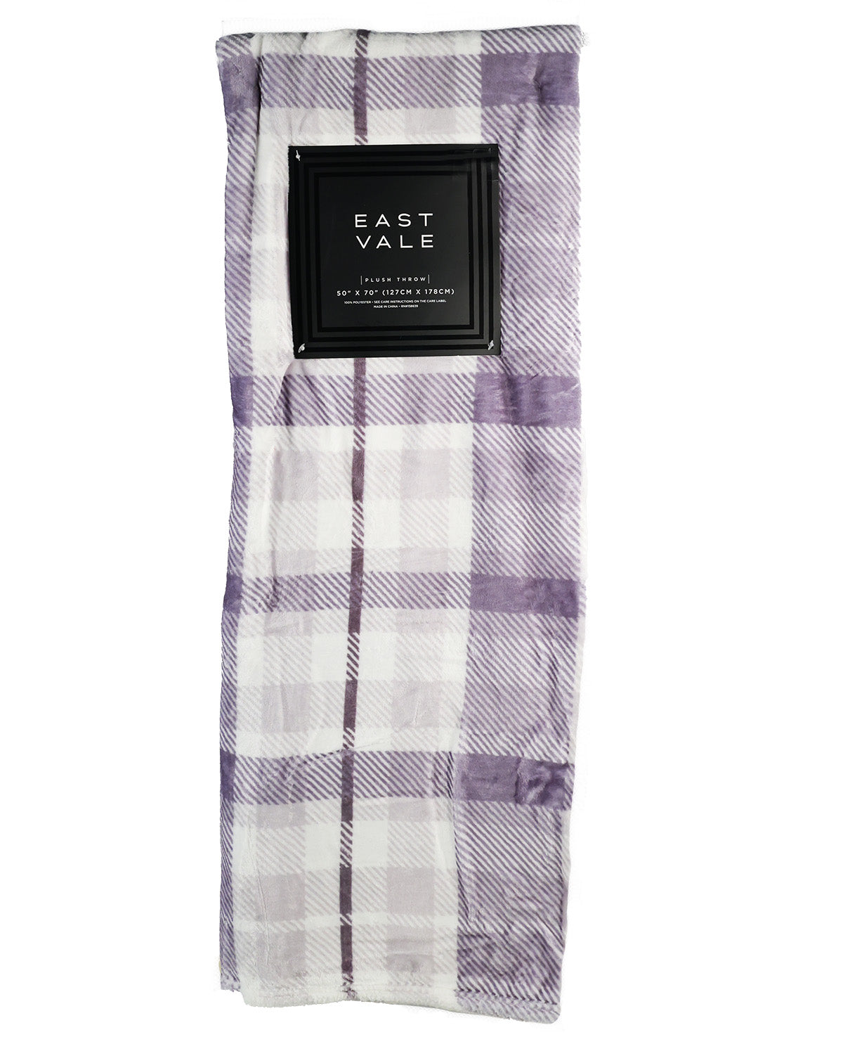 A folded plaid throw blanket in lavender and white, featuring a black fabric label with the brand name 'EAST VALE' on a white background.