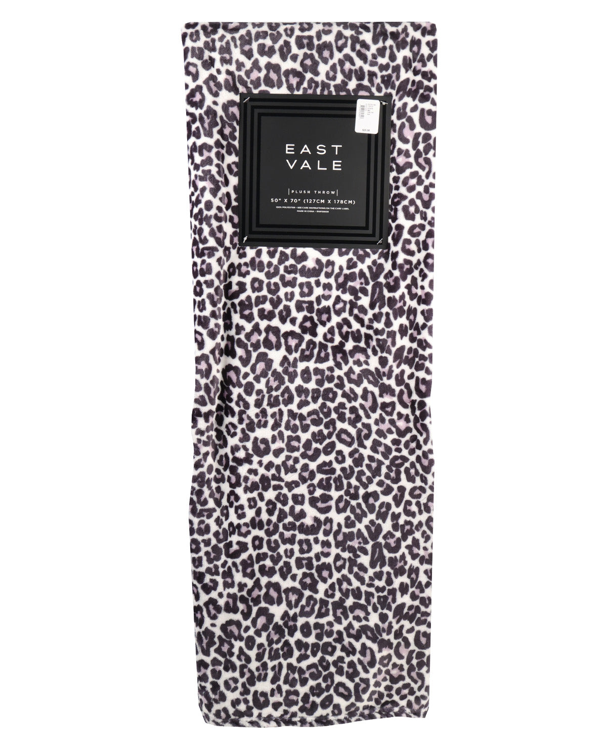 Leopard print travel towel with East Vale label on a white background