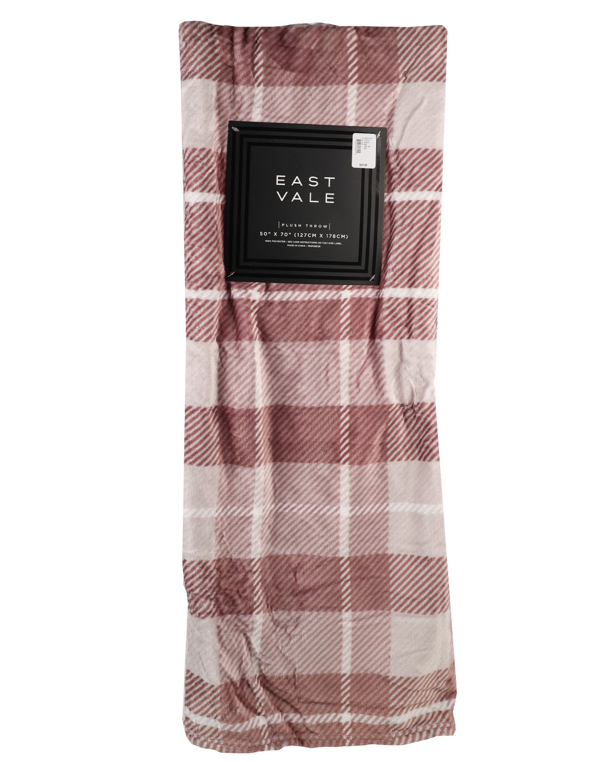 A folded plaid throw blanket in dusty rose and cream, packaged with a black paper sleeve labeled 'EAST VALE'.