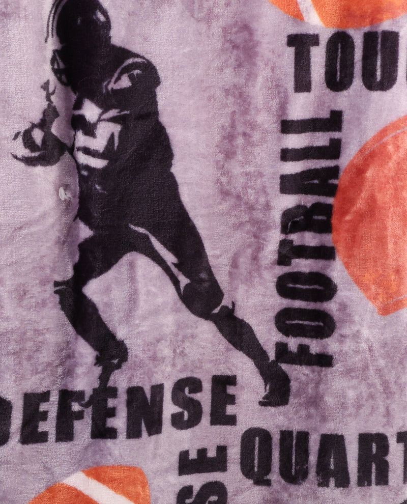 Fabric with football player design and text on a gray background