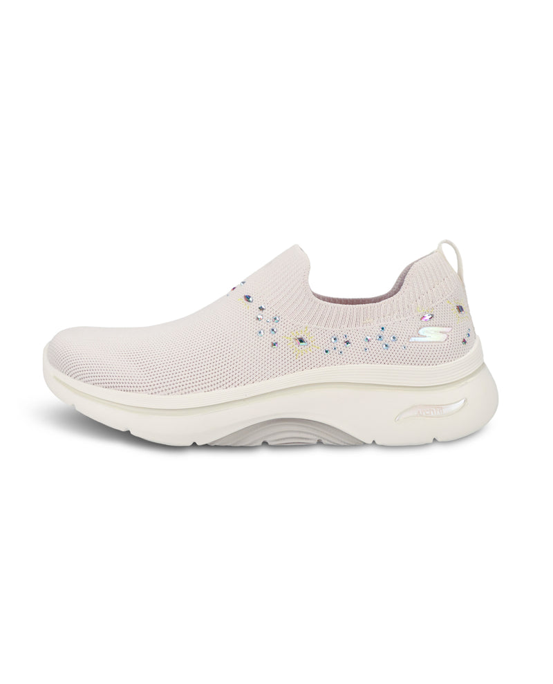 A light beige knit slip-on sneaker with small multicolor rhinestone embellishments on the side, shown from a profile view against a white background.