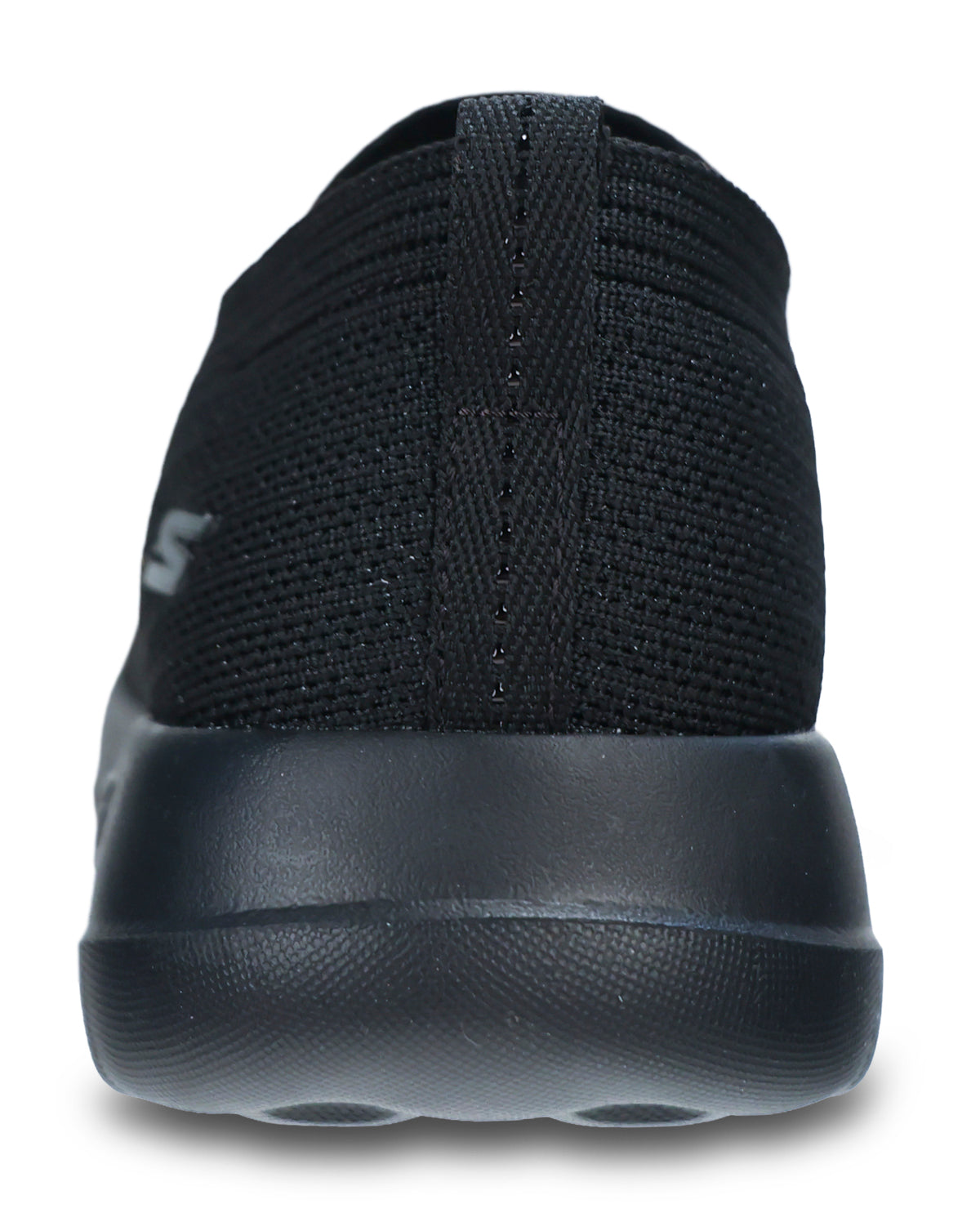 Black knit slip-on shoe shown from the back, featuring a textured knit upper and a thick black sole, photographed on a white background.
