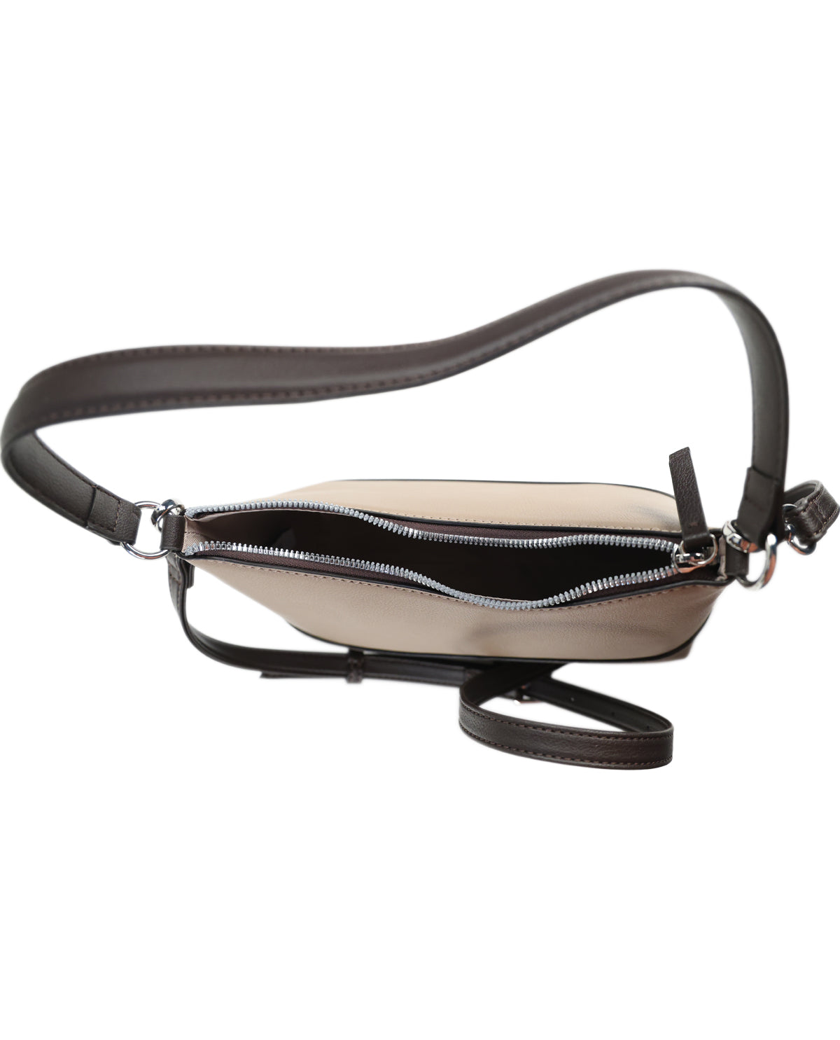 A beige and black leather crossbody bag with a wide adjustable shoulder strap, shown from a side profile view with the front zipper open, on a solid white background.