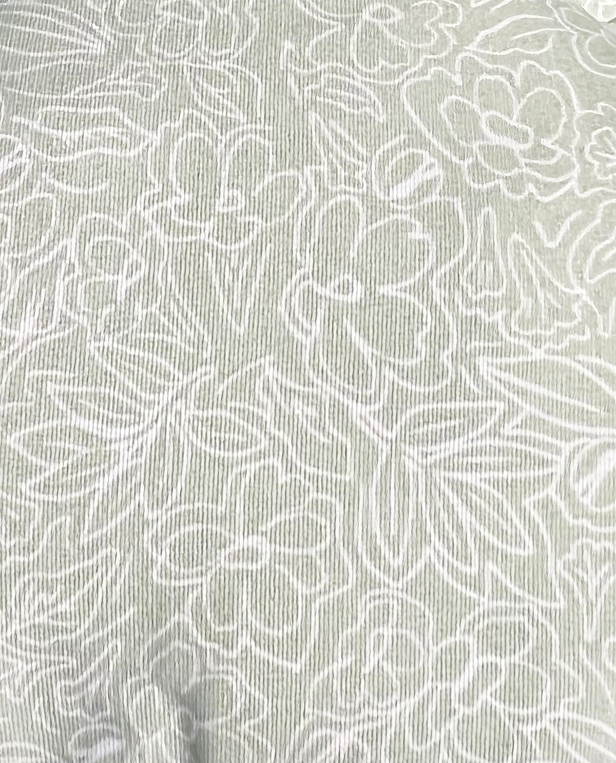 White floral pattern on a light gray background