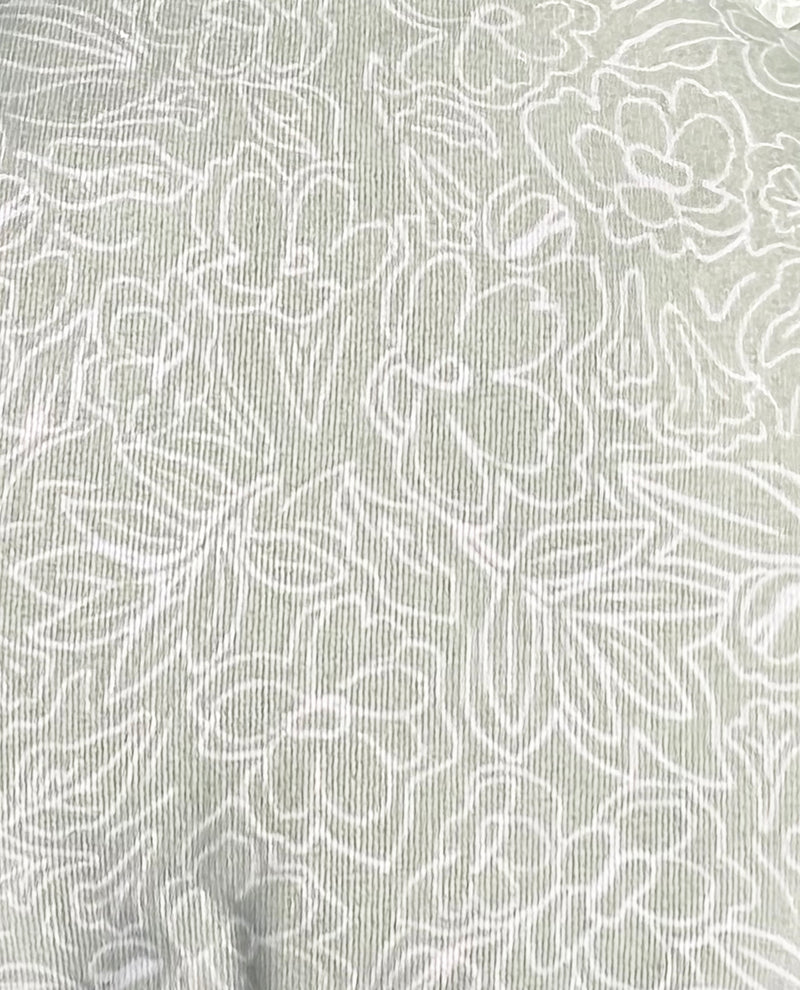 White floral pattern on a light gray background